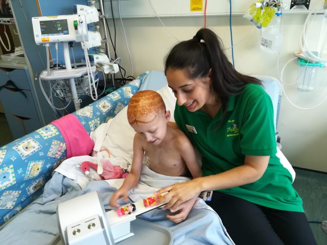 Lovely Olivia with toy MRI machine